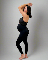 Continuall pregnancy compression tight with a bump panel that grows to full term